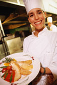 Martha Rosler subtitled this photo 'professional cook is happy, submissive, and bountiful'